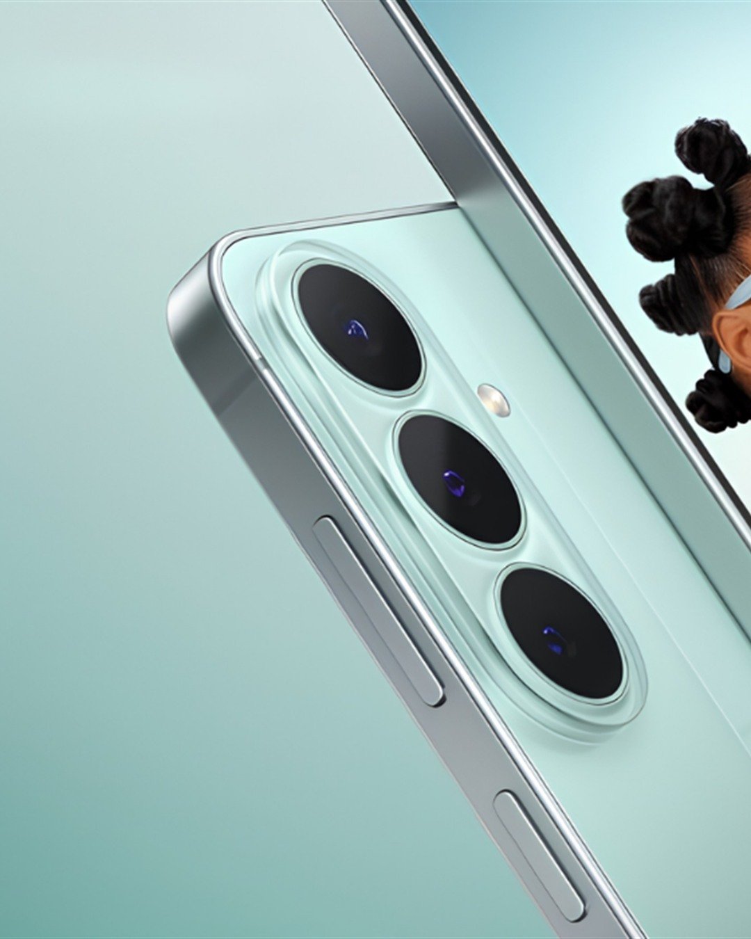 Official Samsung Galaxy S26 FE in green with its rear cameras and front display.