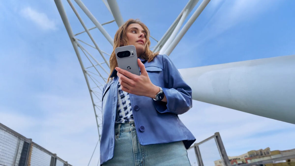 Official Google product photograph of a person holding a Google Pixel phone, used to illustrate Google’s Assistant-to-Gemini mobile transition.